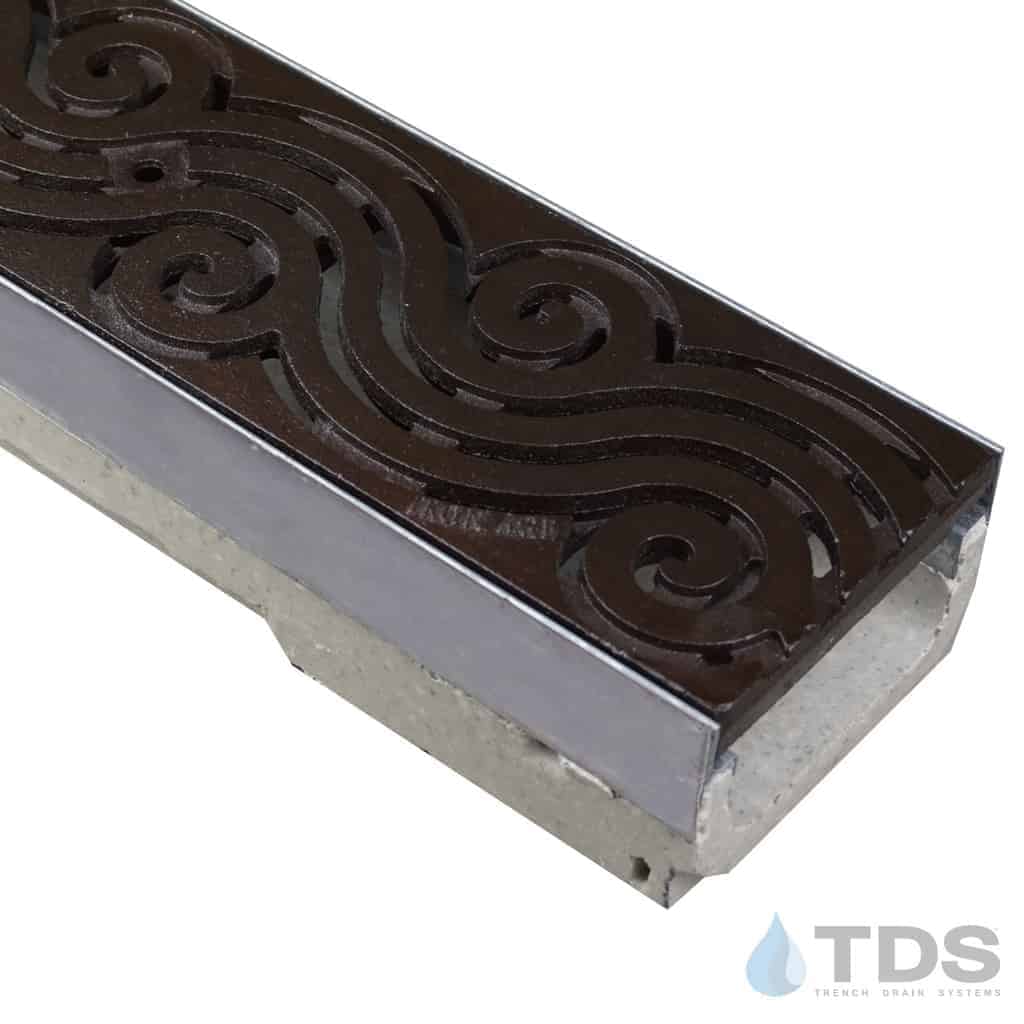 M100KX polymer concrete channel with stainless steel edge and Iron Age Baked on Oil Finish Argo grate