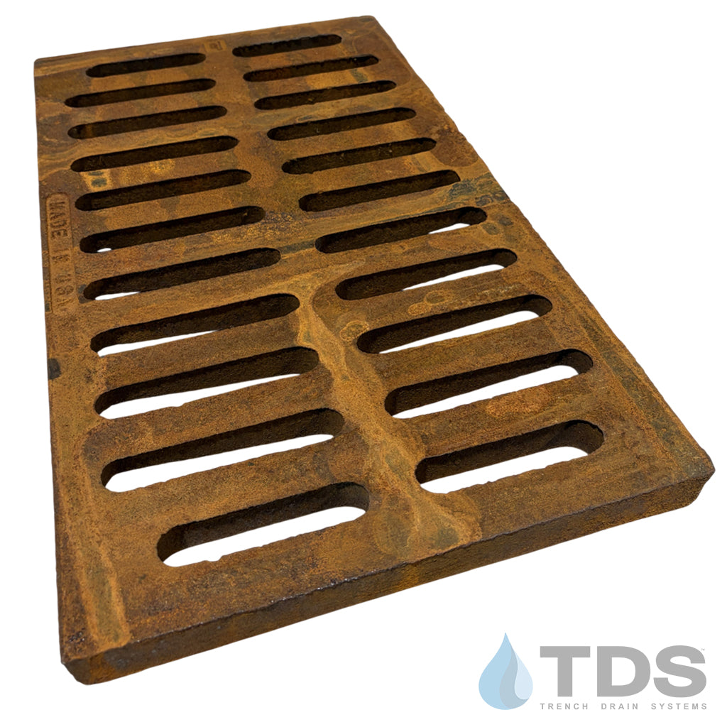 EJ6953M2-6954M2 Rust-colored heavy-duty metal drain cover with 'TDS' branding on a white background